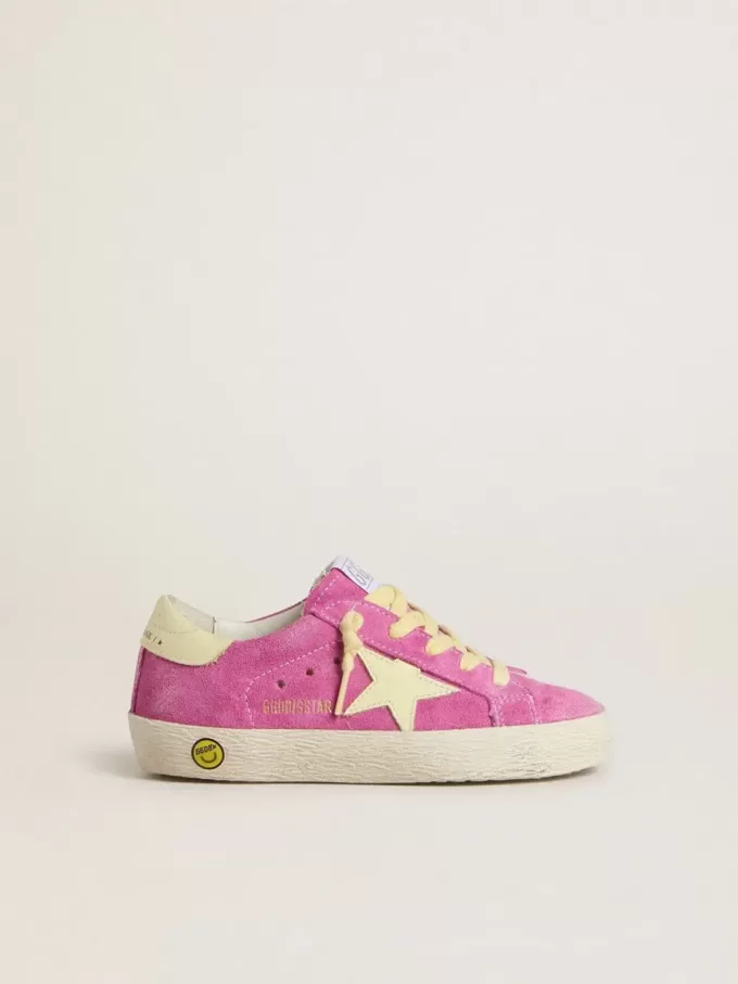 Junior Super-Star in pelle scamosciata rosa con stella giallo chiaro e linguetta sul tallone
