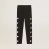 Leggings neri da bambina con stelle bianche sui lati Leggings neri da bambina con stelle bianche sui lati
