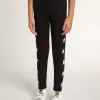 Leggings neri da bambina con stelle bianche sui lati Leggings neri da bambina con stelle bianche sui lati