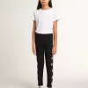 Leggings neri da bambina con stelle bianche sui lati Leggings neri da bambina con stelle bianche sui lati