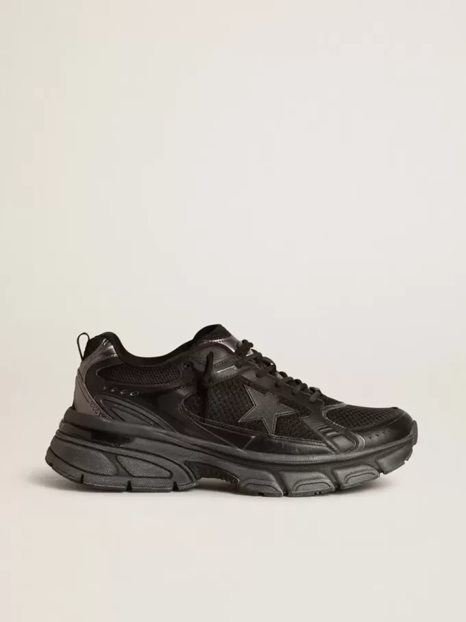 Lightstar da donna con tomaia in pelle nera e mesh e stella nera Lightstar da donna con tomaia in pelle nera e mesh e stella nera