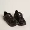 Lightstar da donna con tomaia in pelle nera e mesh e stella nera Lightstar da donna con tomaia in pelle nera e mesh e stella nera
