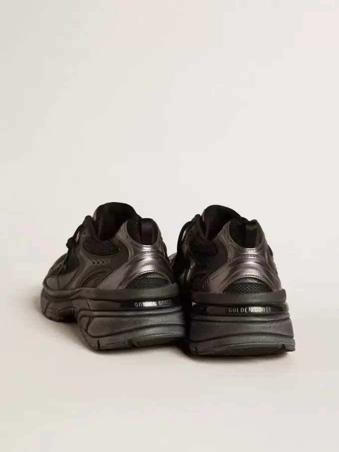 Lightstar da donna con tomaia in pelle nera e mesh e stella nera Lightstar da donna con tomaia in pelle nera e mesh e stella nera