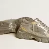 Lightstar da donna in pelle metallizzata e rete argentata con stella grigia Lightstar da donna in pelle metallizzata e rete argentata con stella grigia