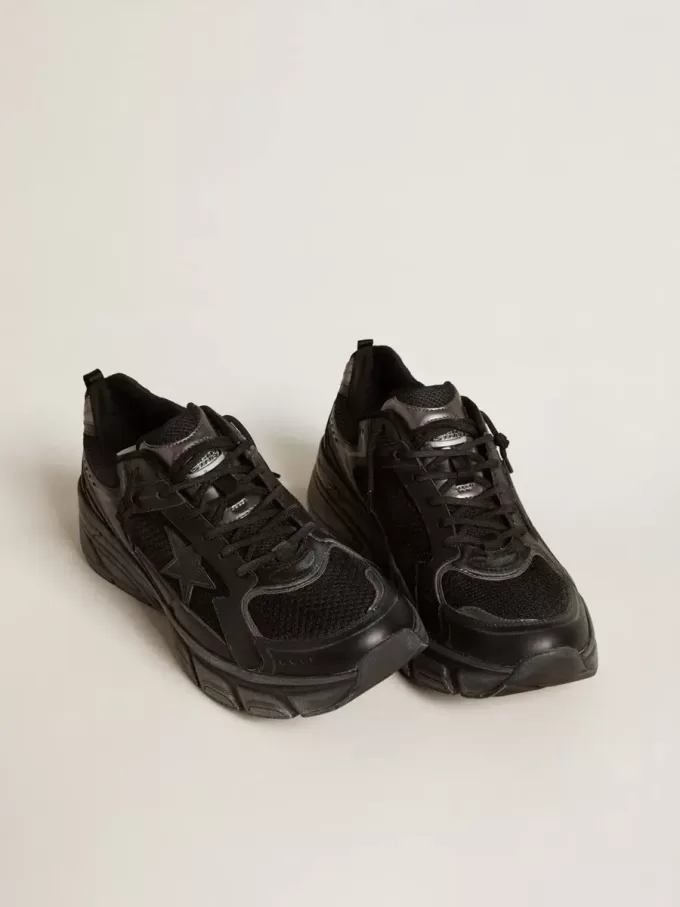 Lightstar da uomo con tomaia in pelle nera e mesh e stella nera