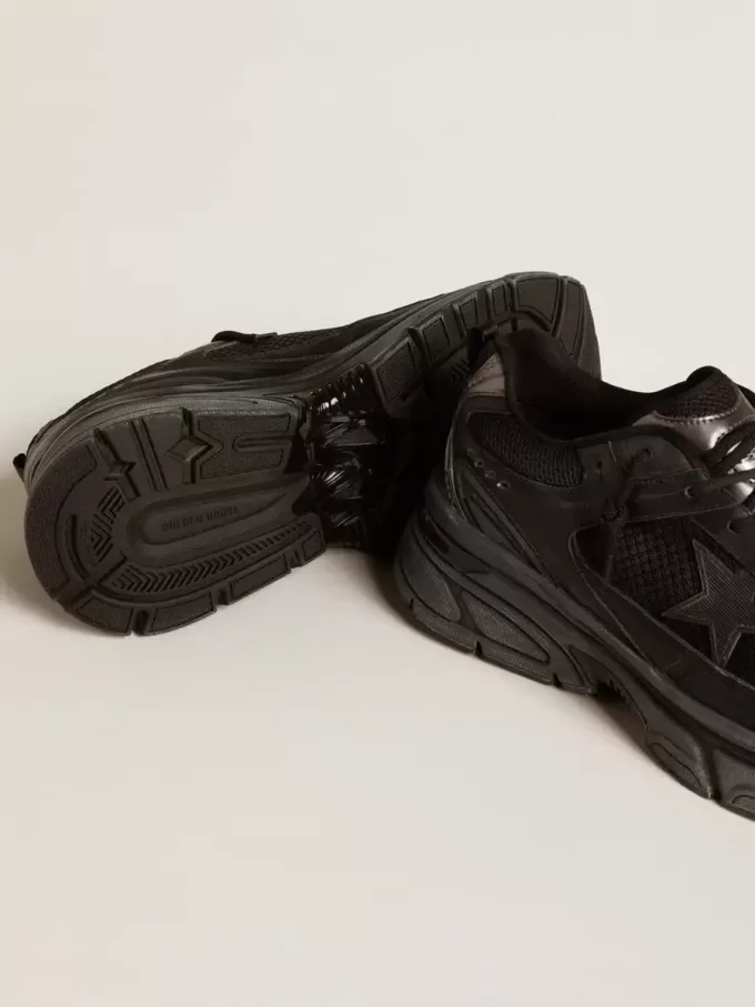Lightstar da uomo con tomaia in pelle nera e mesh e stella nera