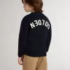 Maglione blu da bambino con collo a giro e scritta “Golden” sul retro