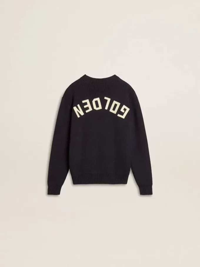 Maglione blu da bambino con collo a giro e scritta “Golden” sul retro