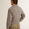 Maglione corto da donna in lana grigio melange con paillettes Maglione corto da donna in lana grigio melange con paillettes