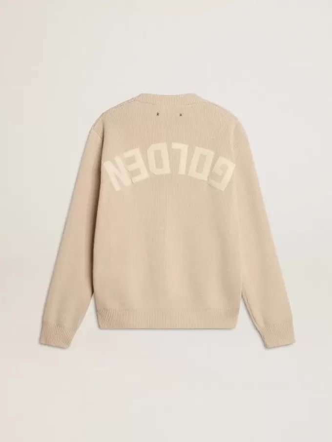 Maglione da donna beige con scritta “Golden” sul retro Maglione da donna beige con scritta “Golden” sul retro