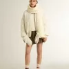 Maglione da donna con collo a giro in lana merino bianca con cristalli su tutta la superficie Maglione da donna con collo a giro in lana merino bianca con cristalli su tutta la superficie