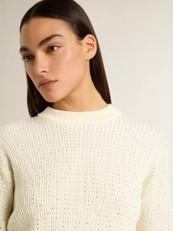 Maglione da donna con collo a giro in lana merino bianca con cristalli su tutta la superficie Maglione da donna con collo a giro in lana merino bianca con cristalli su tutta la superficie