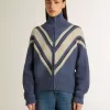Maglione da donna in lana jacquard azzurro con motivo color crema Maglione da donna in lana jacquard azzurro con motivo color crema