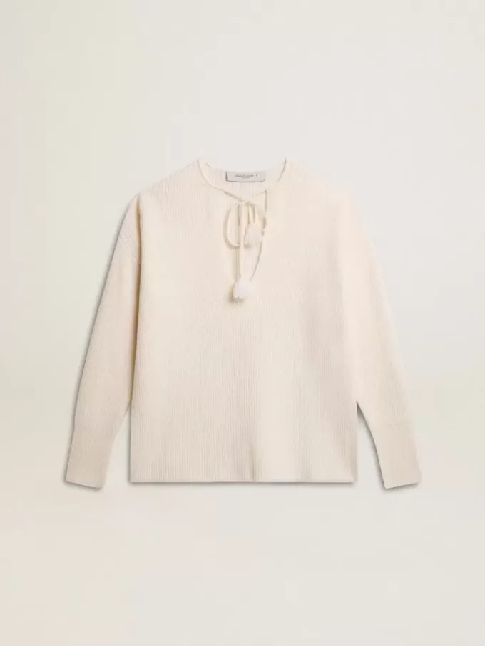 Maglione in lana a coste con scollo a V e coulisse con nappine