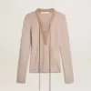 Maglione in lana beige con dettagli in pelle Maglione in lana beige con dettagli in pelle
