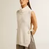 Maglione unisex bianco a collo alto senza maniche in lana a costine Maglione unisex bianco a collo alto senza maniche in lana a costine