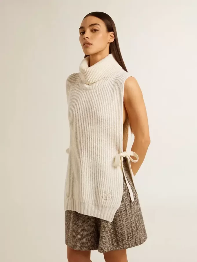 Maglione unisex bianco a collo alto senza maniche in lana a costine Maglione unisex bianco a collo alto senza maniche in lana a costine