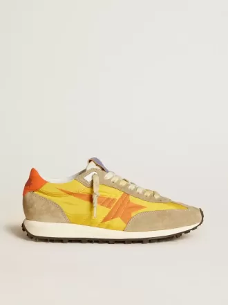 Marathon da donna con tomaia in nylon giallo e stella arancione