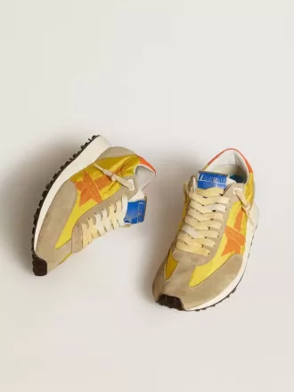 Marathon da donna con tomaia in nylon giallo e stella arancione