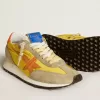 Marathon da donna con tomaia in nylon giallo e stella arancione Marathon da donna con tomaia in nylon giallo e stella arancione