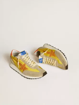 Marathon da uomo con tomaia in nylon giallo e stella arancione