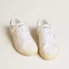 Matchstar da donna in pelle bianca con tallone in pelle blu scuro