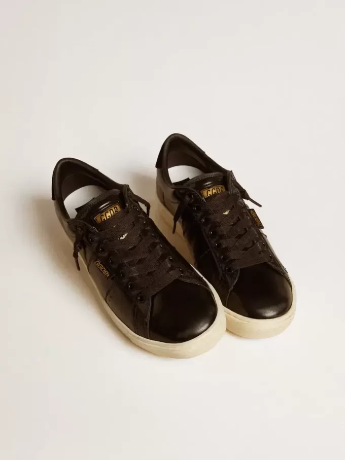 Matchstar da donna in pelle nera con linguetta sul tallone in camoscio nero