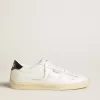 Matchstar in pelle bianca con linguetta sul tallone in pelle blu scuro