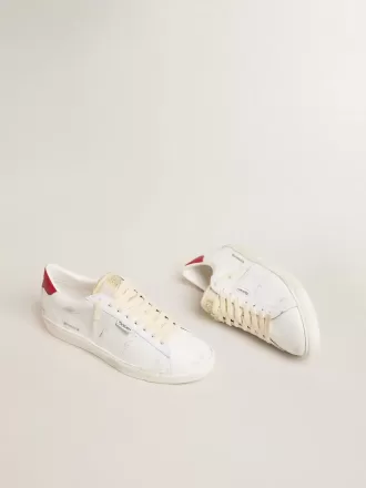 Matchstar in pelle bianca lucida con linguetta del tallone in pelle rossa lucida
