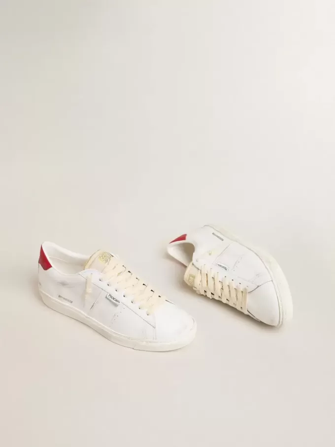 Matchstar in pelle bianca lucida con linguetta del tallone in pelle rossa lucida