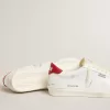 Matchstar in pelle bianca lucida con linguetta del tallone in pelle rossa lucida