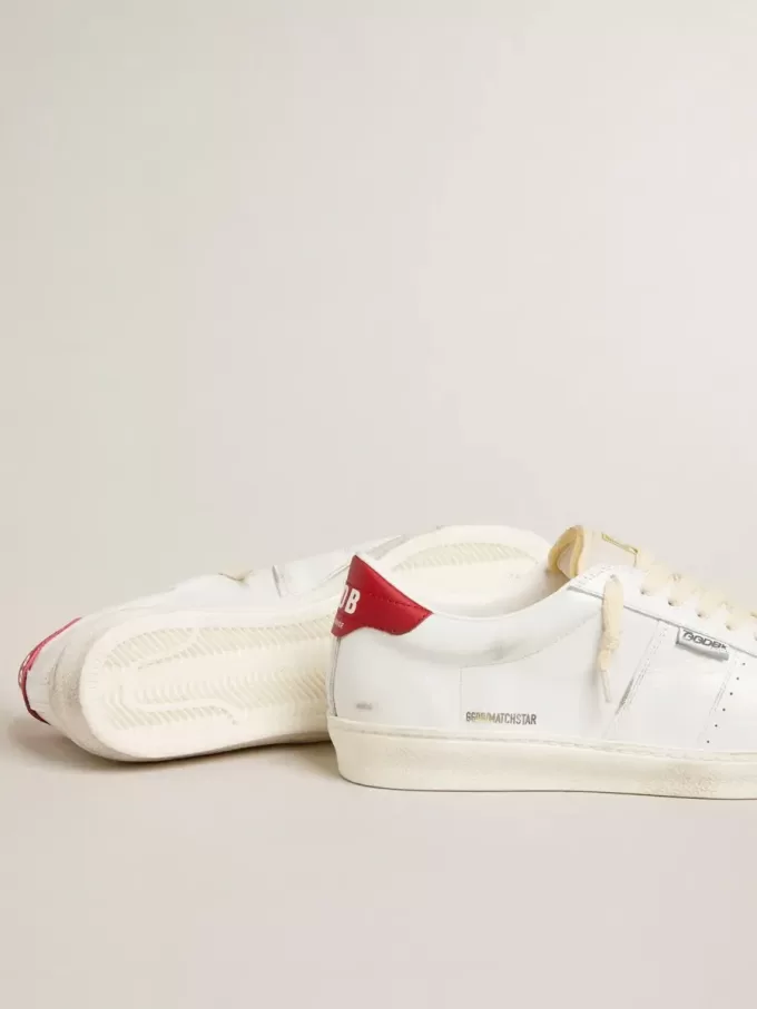 Matchstar in pelle bianca lucida con linguetta del tallone in pelle rossa lucida
