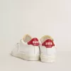 Matchstar in pelle bianca lucida con linguetta del tallone in pelle rossa lucida