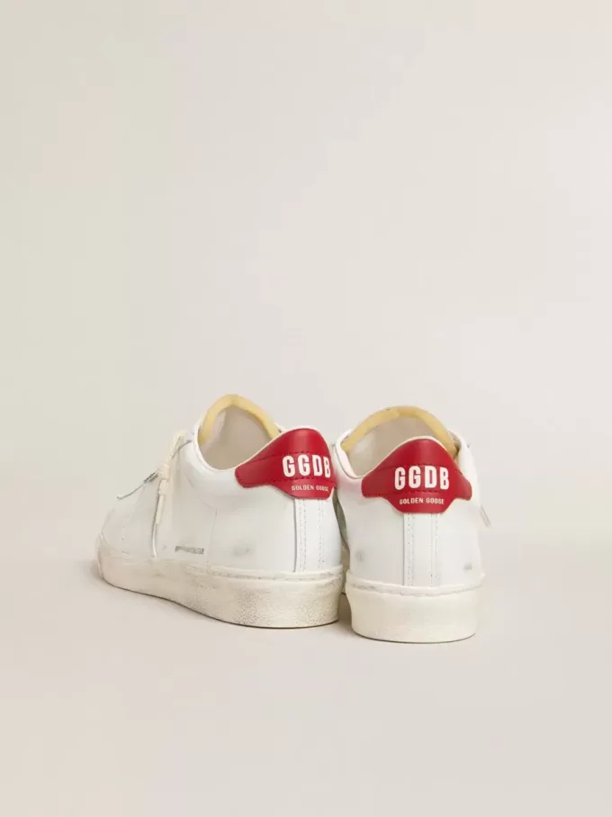 Matchstar in pelle bianca lucida con linguetta del tallone in pelle rossa lucida