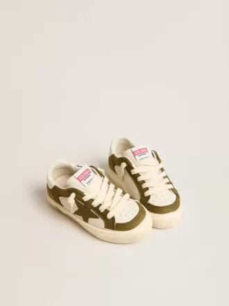 May Young in pelle bianca e verde militare