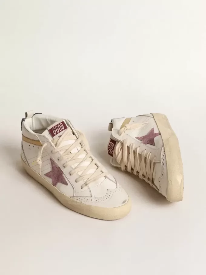 Mid Star con stella in pelle scamosciata rosa e dettagli in pelle metallizzata dorata Mid Star con stella in pelle scamosciata rosa e dettagli in pelle metallizzata dorata