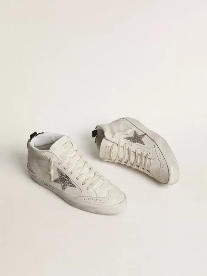 Mid Star da donna con stella glitterata argento e linguetta laminata nera sul tallone Mid Star da donna con stella glitterata argento e linguetta laminata nera sul tallone