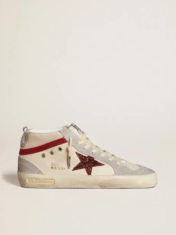 Mid Star da donna in pelle con stella glitterata e dettagli in nabuk rosso Mid Star da donna in pelle con stella glitterata e dettagli in nabuk rosso