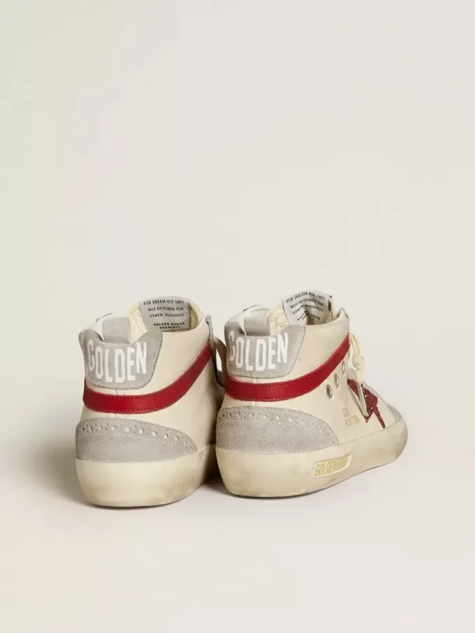 Mid Star da donna in pelle con stella glitterata e dettagli in nabuk rosso Mid Star da donna in pelle con stella glitterata e dettagli in nabuk rosso