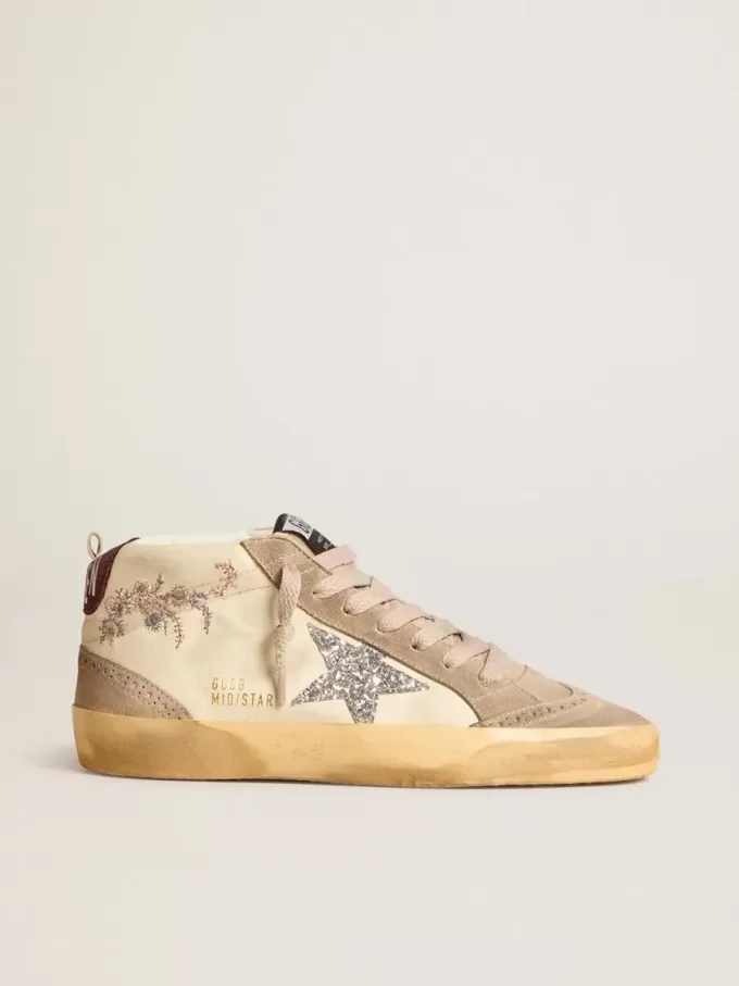 Mid Star da donna in pelle nappa con ricami floreali e stella glitterata argento Mid Star da donna in pelle nappa con ricami floreali e stella glitterata argento