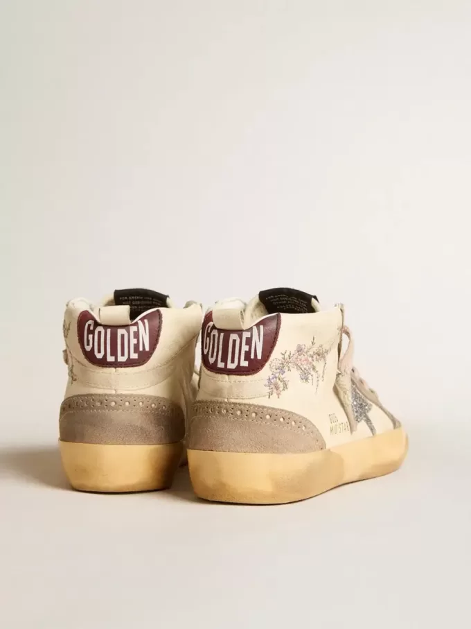 Mid Star da donna in pelle nappa con ricami floreali e stella glitterata argento Mid Star da donna in pelle nappa con ricami floreali e stella glitterata argento