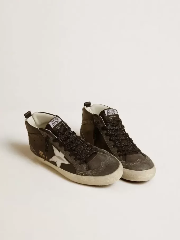Mid Star da donna in pelle nera con stella in pelle metallizzata argento Mid Star da donna in pelle nera con stella in pelle metallizzata argento