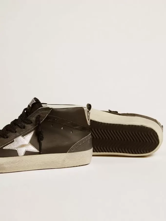 Mid Star da donna in pelle nera con stella in pelle metallizzata argento Mid Star da donna in pelle nera con stella in pelle metallizzata argento