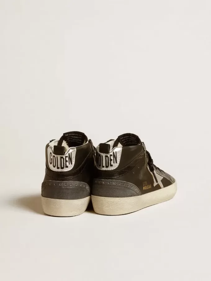 Mid Star da donna in pelle nera con stella in pelle metallizzata argento Mid Star da donna in pelle nera con stella in pelle metallizzata argento