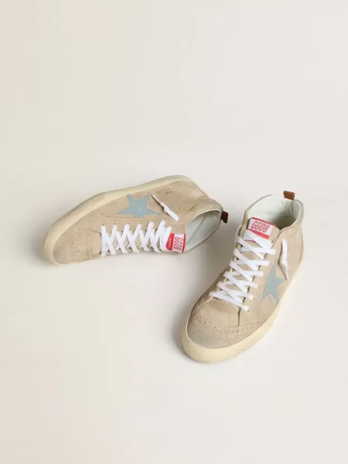 Mid Star da uomo in pelle scamosciata beige con stella e linguetta sul tallone in pelle blu polvere Mid Star da uomo in pelle scamosciata beige con stella e linguetta sul tallone in pelle blu polvere