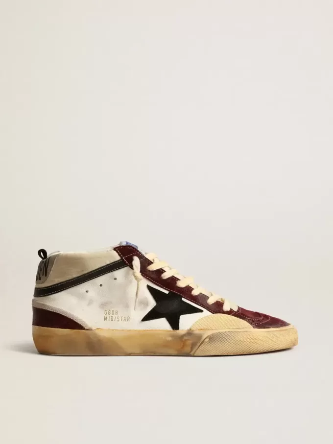 Mid Star in nappa con stella in pelle scamosciata nera e inserti color vino Mid Star in nappa con stella in pelle scamosciata nera e inserti color vino