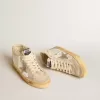Mid Star LTD con stella in pelle scamosciata perlata e linguetta sul tallone in maglia beige