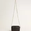 Mini Star Bag in pelle nera con stella tono su tono Mini Star Bag in pelle nera con stella tono su tono