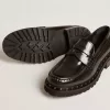 Mocassini da donna chunky in pelle nera con borchie Mocassini da donna chunky in pelle nera con borchie