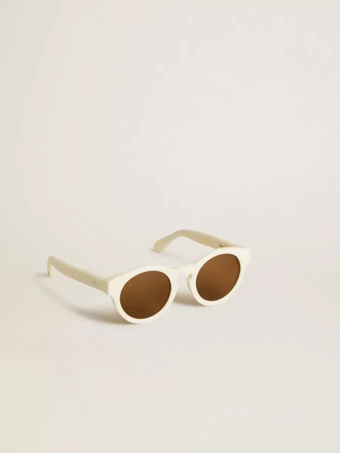 Occhiali da sole Panthos di forma quadrata con montatura beige e dettagli dorati Occhiali da sole Panthos di forma quadrata con montatura beige e dettagli dorati